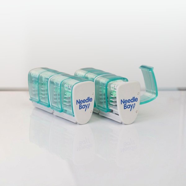 NeedleBay twin pack, two pen needle cases on a table